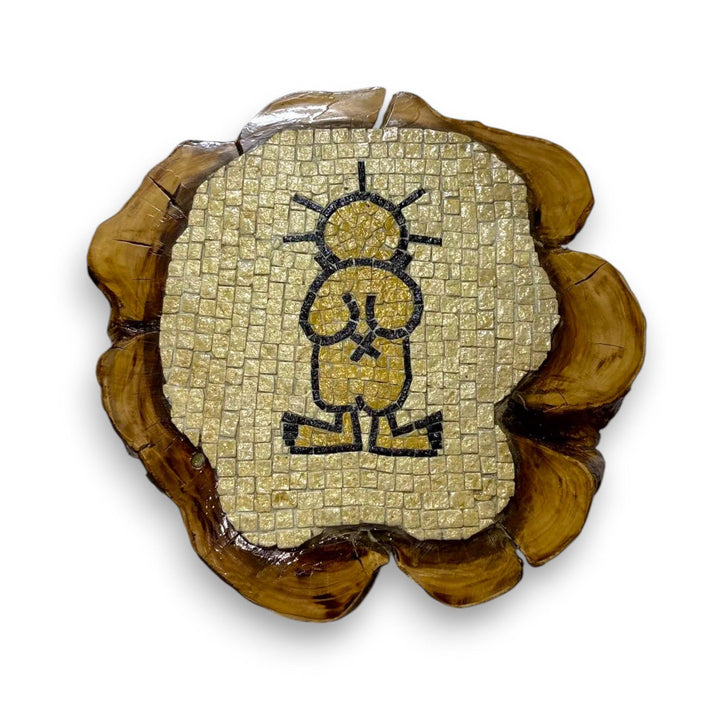Pal-Mosaic Handala mosaic decor featuring black and beige tiles on natural wood slab background