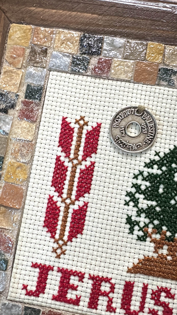 Pal-Mosaic handmade Jerusalem mosaic with detailed embroidery and colorful tile border