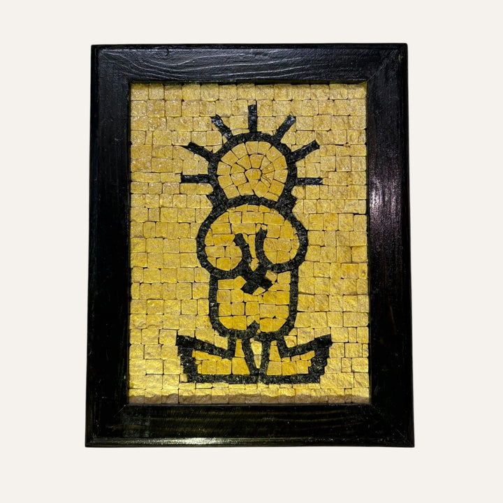 Handmade Palestinian Handala mosaic art with black and yellow tiles in a black wooden frame by Pal-Mosaic