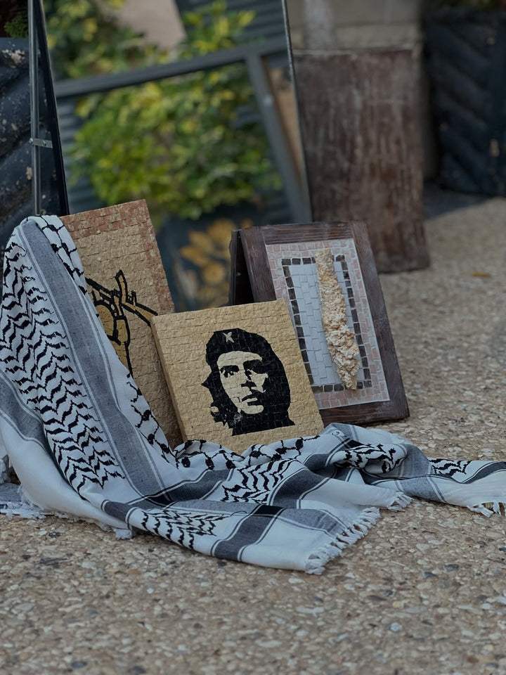 Pal-Mosaic handmade Che Guevara mosaic crafted with small square tiles in black and gold colors