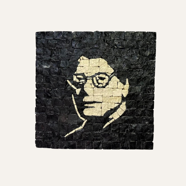 Pal-Mosaic black and white Mahmoud Darwish mosaic art depicting the poet's face in stone tiles